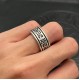 Open scroll ring