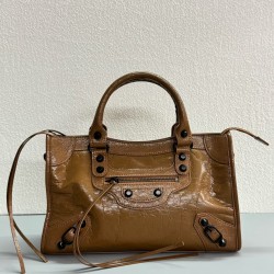 380 Upgraded Medium Brown New Le City Biker Bag A classic reinterpreted The return of the iconic BALENCIAGA Le City bag first introduced in 2000The reintroduced Le City is crafted in luxurious Arena leather emphasizing vintage detailing including the orig