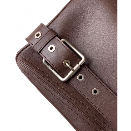 1180 Large Glossy Cowhide Puzzle Biker HandbagPuzzle with distinctive geometric lines that define the rectangular shapeThis large version is made of glossy cowhide leather with biker-inspired detailingCan be worn over the shoulderCrossbody or handheldDeta