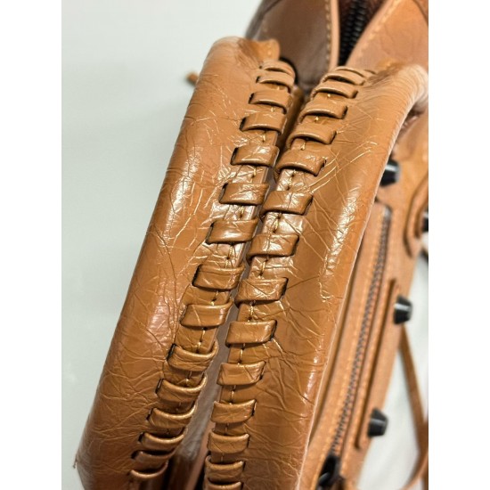 360 Upgraded Small Brown New Le City Biker Bag A classic reinterpreted The return of the iconic BALENCIAGA Le City, first introduced in 2000 The reintroduced Le City is crafted in luxurious Arena leather emphasizing vintage details including the original 