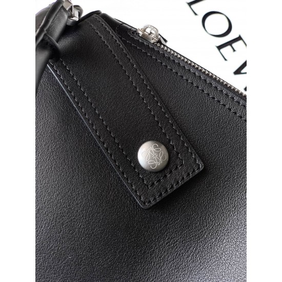 1180 Original Large Glossy Cowhide Puzzle Biker HandbagPuzzle with distinctive geometric lines outlining the rectangular shapeThis large version is made of glossy cowhide leather with biker detailsShoulder or hand carryCrossbody or hand carryRemovable and