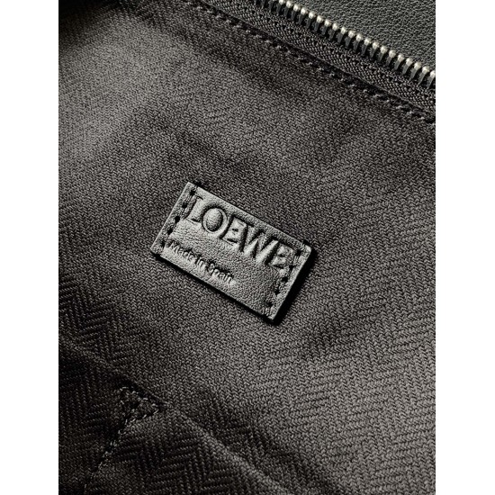 1180 Original Large Glossy Cowhide Puzzle Biker HandbagPuzzle with distinctive geometric lines outlining the rectangular shapeThis large version is made of glossy cowhide leather with biker detailsShoulder or hand carryCrossbody or hand carryRemovable and