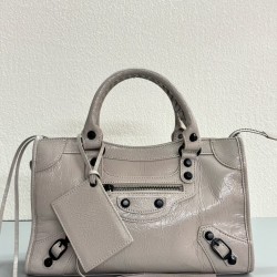 380 Upgraded Medium Milk Tea New Le City Biker Bag A classic reinterpreted The return of the iconic BALENCIAGA Le City bag first introduced in 2000The reintroduced Le City is crafted in luxurious Arena leather emphasizing vintage detailing including the o