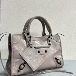 380 Upgraded Medium Milk Tea New Le City Biker Bag A classic reinterpreted The return of the iconic BALENCIAGA Le City bag first introduced in 2000The reintroduced Le City is crafted in luxurious Arena leather emphasizing vintage detailing including the o