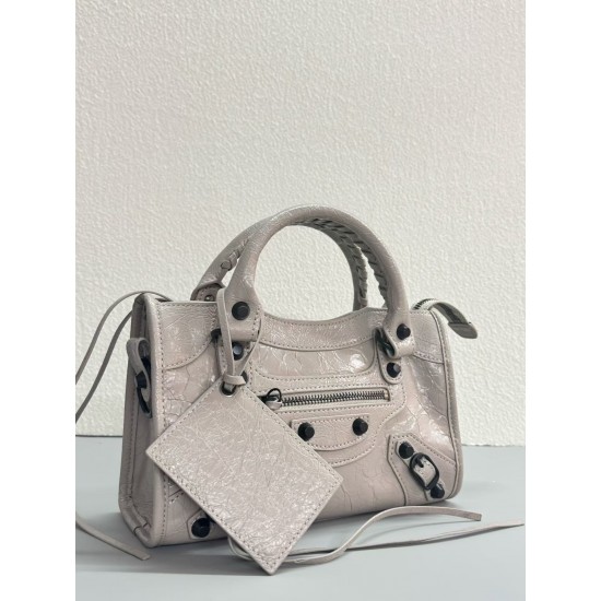 360 Upgraded Small Milk Tea New Le City Biker Bag A classic reinterpreted The return of the iconic BALENCIAGA Le City, first introduced in 2000 The reintroduced Le City is crafted in luxurious Arena leather emphasizing vintage detailing including the orig