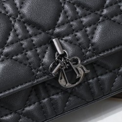 200 WITH BOX LADY DIOR MOBILE PHONE POUCH BLACK GUN CLOSURE This Lady Dior cell phone pouch is elegantly crafted in creamy white sheepskin leather with a rattan check pattern and a removable light gold-tone metal DIOR charm with a detachable chain adorned