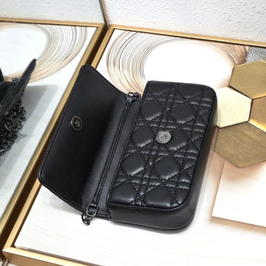 200 WITH BOX LADY DIOR MOBILE PHONE POUCH BLACK GUN CLOSURE This Lady Dior cell phone pouch is elegantly crafted in creamy white sheepskin leather with a rattan check pattern and a removable light gold-tone metal DIOR charm with a detachable chain adorned