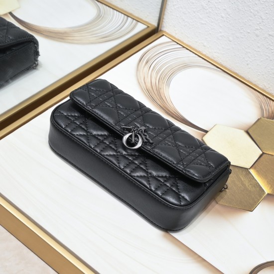 200 WITH BOX LADY DIOR MOBILE PHONE POUCH BLACK GUN CLOSURE This Lady Dior cell phone pouch is elegantly crafted in creamy white sheepskin leather with a rattan check pattern and a removable light gold-tone metal DIOR charm with a detachable chain adorned