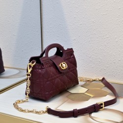 210 The Dior Jolie Top Handle Mini Chain Handbag is a new addition to the Early Spring 2016 Ready-to-Wear collection and features an elegant and sophisticated design crafted in creamy white sheepskin leather adorned with rattan latticework flap embellishe