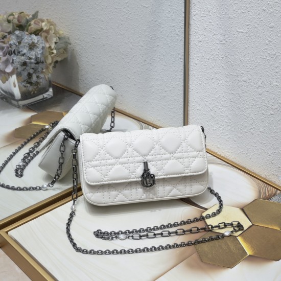 200 WITH BOX LADY DIOR MOBILE PHONE POUCH WHITE GUN CLOSURE This Lady Dior cell phone pouch is elegantly crafted in creamy white sheepskin leather with a rattan check pattern and a removable light gold-tone metal DIOR charm with a detachable chain adorned