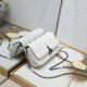 200 WITH BOX LADY DIOR MOBILE PHONE POUCH WHITE GUN CLOSURE This Lady Dior cell phone pouch is elegantly crafted in creamy white sheepskin leather with a rattan check pattern and a removable light gold-tone metal DIOR charm with a detachable chain adorned