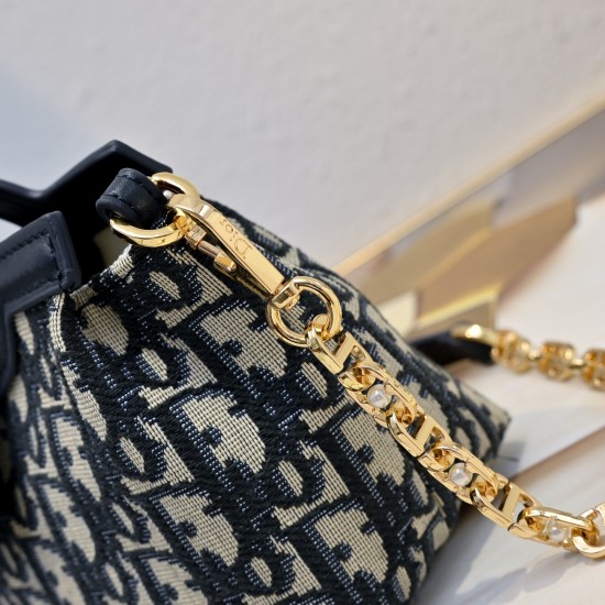 210 This Dior Jolie Top Handle Mini Chain Bag from the Early Spring 2016 Ready-to-Wear collection is an elegant and sophisticated design crafted in creamy white sheepskin leather with a rattan check flap embellished with a gold-tone metal CD logo and whit