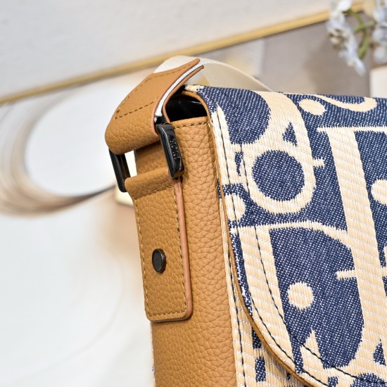 NEW SHIPPING 260 ORIGINAL BLUE FABRIC FEATURED TOP OF THE LINE WITH LEATHER ORIGINAL This mini saddle messenger bag is smart and stylish, crafted in black grained cowhide leather with a flap closure and the DIOR logo to emphasize the sophistication and ch