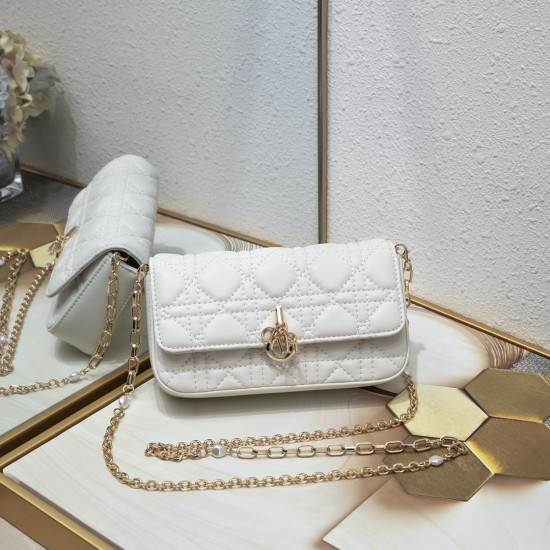 200 WITH BOX LADY DIOR MOBILE PHONE POUCH WHITE GOLD BUCKLE This Lady Dior cell phone pouch is elegantly crafted in creamy white sheepskin leather with a rattan check pattern and a removable light gold finish metal DIOR charm with a detachable chain adorn