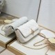 200 WITH BOX LADY DIOR MOBILE PHONE POUCH WHITE GOLD BUCKLE This Lady Dior cell phone pouch is elegantly crafted in creamy white sheepskin leather with a rattan check pattern and a removable light gold finish metal DIOR charm with a detachable chain adorn