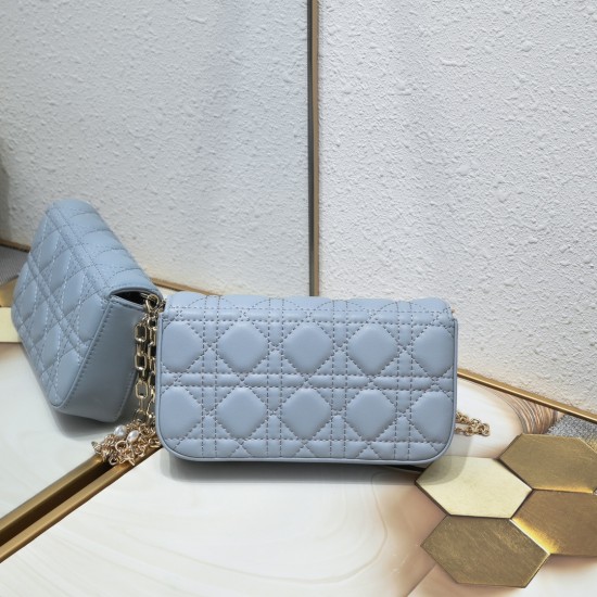 200 WITH BOX LADY DIOR MOBILE PHONE POUCH BLUE GOLD BUCKLE This Lady Dior cell phone pouch is elegantly crafted in creamy white sheepskin leather with rattan check pattern and removable light gold finish metal DIOR charm and detachable chain with resin be