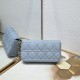 200 WITH BOX LADY DIOR MOBILE PHONE POUCH BLUE GOLD BUCKLE This Lady Dior cell phone pouch is elegantly crafted in creamy white sheepskin leather with rattan check pattern and removable light gold finish metal DIOR charm and detachable chain with resin be
