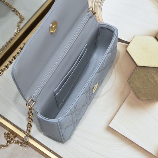 200 WITH BOX LADY DIOR MOBILE PHONE POUCH BLUE GOLD BUCKLE This Lady Dior cell phone pouch is elegantly crafted in creamy white sheepskin leather with rattan check pattern and removable light gold finish metal DIOR charm and detachable chain with resin be