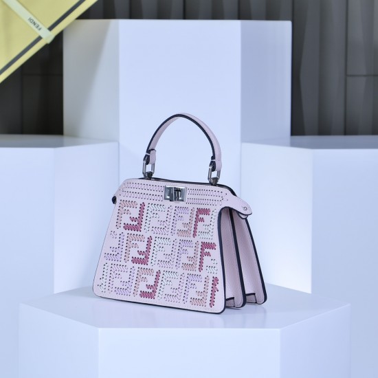 360 model 33208 the iconic peekaboo iseeu ideal compact handbag is hand stitched with 306 stitches in the same color with large bright threads representing traditional selleria craftsmanship in a selection of dove grey cuoio romano leather with signature 