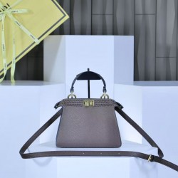 350 model 33208 the iconic peekaboo iseeu ideal compact handbag is hand stitched with 306 stitches in the same color with large bright threads representing traditional selleria craftsmanship in a selection of dove grey cuoio romano leather with signature 