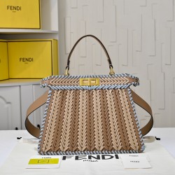 410 Model 33200 New! New in stock New in stock Iconic Peekaboo ISeeU large handbag Handmade leather weave with signature twist lock on both sidesSoft leather lining in the same color visible from the outsideTwo compartments separated by a rigid dividerFea