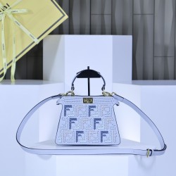 360 model 33208 the iconic peekaboo iseeu ideal compact handbag is hand stitched with 306 stitches in the same color with large bright threads representing traditional selleria craftsmanship in a selection of dove grey cuoio romano leather with signature 