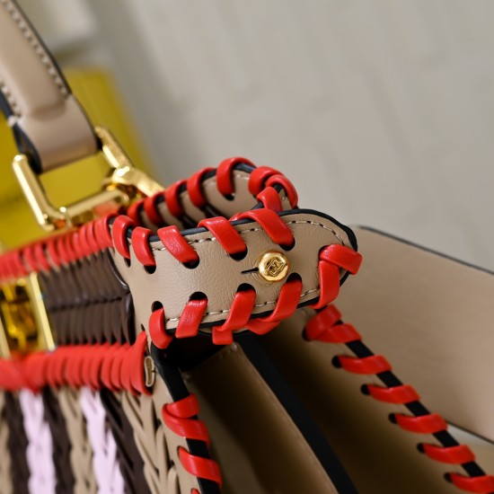 410 Model 33200 New! New in stock New in stock Iconic Peekaboo ISeeU large handbag Handmade leather weave with signature twist lock on both sidesSoft leather lining in the same color visible from the outsideTwo compartments separated by a rigid dividerFea