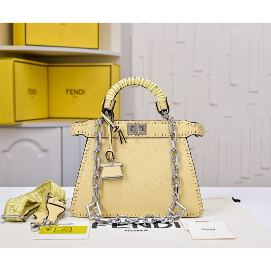 350 model 7705 the iconic peekaboo iseeu ideal compact handbag is hand-stitched with 306 stitches in the same color and large bright threads representing traditional selleria craftsmanship in a selection of dove grey cuoio romano leather with iconic natur