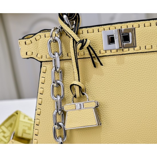 350 model 7705 the iconic peekaboo iseeu ideal compact handbag is hand-stitched with 306 stitches in the same color and large bright threads representing traditional selleria craftsmanship in a selection of dove grey cuoio romano leather with iconic natur