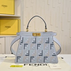 430 Model 33207 New! New in stock New in stock Iconic Peekaboo ISeeU large handbag handmade leather weave with signature twist lock on both sides from the outside you can see the soft leather lining in the same color Two compartments separated by a rigid 