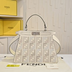 430 Model 33207 New! New in stock New in stock Iconic Peekaboo ISeeU large handbag handmade leather weave with signature twist lock on both sides from the outside you can see the soft leather lining in the same color Two compartments separated by a rigid 