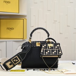 Model 3309320NEWFendi's iconic Peekaboo ISeeU medium handbag in full-grain leatherLarge, hand-stitched sides with classic twist locksFrom the outside, you can see the full-grain leather lining in the same colorTwo compartments separated by a rigid divider