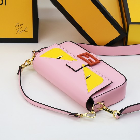 230Fendi BaguetteMedium baguette handbag from the Monster Collection embellished with the original FF red claspFeatures a front flap with magnetic closureInterior compartment with zippered pocketFeatures a leather Selleria seal with gold-tone finishMetal 