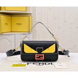 220Fendi BaguetteMedium baguette handbag from the Monster Collection embellished with FF original red buckleFeatures a front flap with magnetic closureInterior compartment with zipper pocketLeather Selleria seal with gold-tone finishMetal hardwareFeatures