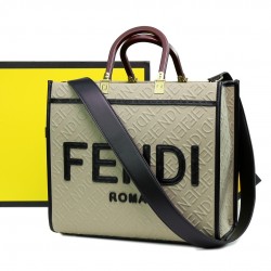Lot 330FEND1 Sunshine medium tote bag in denim with FENDI Mirror pattern all over brown hard leather handles decorated with FENDI ROMA features spacious lined interior compartments with leather silhouette and gold-tone finish metal pieces with two carry h