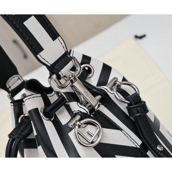 170 Model No. 8950Fendi Roma capsule collectionTwo-tone print Mon Tresor small bucket bag in black and whiteFendi Roma logo reinterpreted by Marc Jacobs in a full-length oversized shapeLined interior and silver-tone finishMetal pieces with Fendi Roma Marc