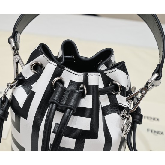 170 Model No. 8950Fendi Roma capsule collectionTwo-tone print Mon Tresor small bucket bag in black and whiteFendi Roma logo reinterpreted by Marc Jacobs in a full-length oversized shapeLined interior and silver-tone finishMetal pieces with Fendi Roma Marc