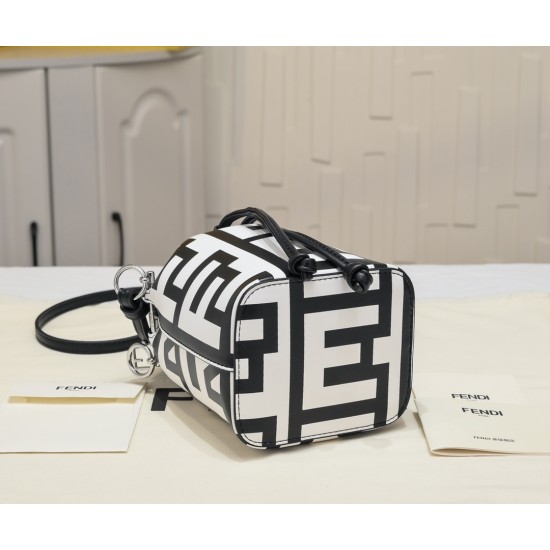 170 Model No. 8950Fendi Roma capsule collectionTwo-tone print Mon Tresor small bucket bag in black and whiteFendi Roma logo reinterpreted by Marc Jacobs in a full-length oversized shapeLined interior and silver-tone finishMetal pieces with Fendi Roma Marc