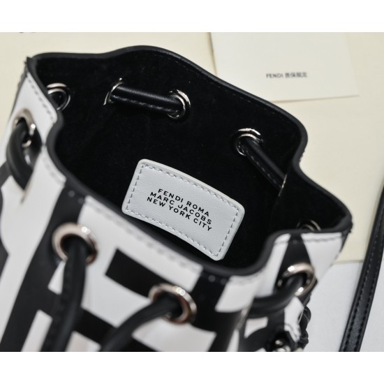 170 Model No. 8950Fendi Roma capsule collectionTwo-tone print Mon Tresor small bucket bag in black and whiteFendi Roma logo reinterpreted by Marc Jacobs in a full-length oversized shapeLined interior and silver-tone finishMetal pieces with Fendi Roma Marc
