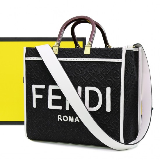 With 330FEND1 SunshineMedium tote bag in denimDenim with FENDI Mirror pattern on all sidesHard brown leather handles with FENDI ROMA letteringFeatures spacious lined interior compartmentsLeather silhouette and gold-tone finishMetal hardwareFeatures two ca