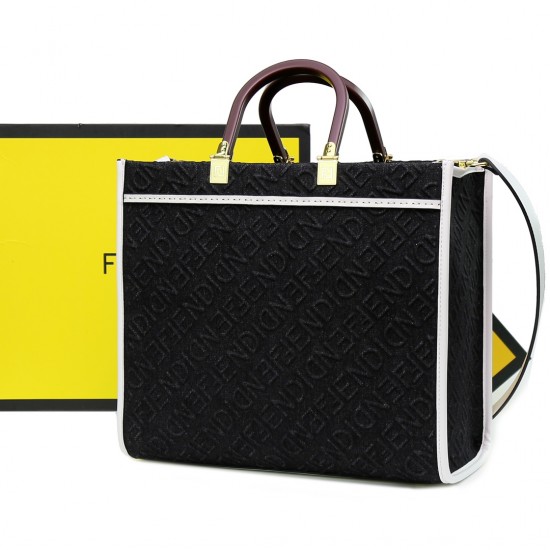 With 330FEND1 SunshineMedium tote bag in denimDenim with FENDI Mirror pattern on all sidesHard brown leather handles with FENDI ROMA letteringFeatures spacious lined interior compartmentsLeather silhouette and gold-tone finishMetal hardwareFeatures two ca