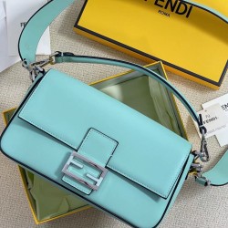 The new Fendi X TiffanyCo Limited Edition Baguette is a classic medium-sized baguette bag made of classic Tiffany BlueTM smooth cowhide leather. The FF hook and loop closure is made of sterling silver with Tiffany BlueTM3 enamel detailing depicting the do