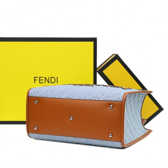 Lot 330FEND1 Sunshine medium tote bag in denim with FENDI Mirror pattern all over brown rigid leather handles decorated with FENDI ROMA features spacious lined interior compartments leather silhouette and gold finish metal pieces with two carry handles an