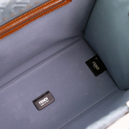 Lot 330FEND1 Sunshine medium tote bag in denim with FENDI Mirror pattern all over brown rigid leather handles decorated with FENDI ROMA features spacious lined interior compartments leather silhouette and gold finish metal pieces with two carry handles an