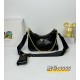 OILED LEATHER VINTAGE NEW RISE TRIPLE REPRODUCTION 2005 ICONIC STYLE SHOULDER BAG Coalescing Prada's design codes into a sophisticated and versatile silhouette creates a dialogue between past and present styles ADJUSTABLE SHOULDER STRAP METAL COMPONENTS D