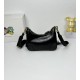 OILED LEATHER VINTAGE NEW RISE TRIPLE REPRODUCTION 2005 ICONIC STYLE SHOULDER BAG Coalescing Prada's design codes into a sophisticated and versatile silhouette creates a dialogue between past and present styles ADJUSTABLE SHOULDER STRAP METAL COMPONENTS D
