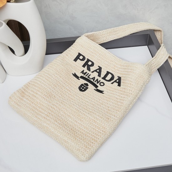 280 Prada Crossbody Bag in raffiaThis softly deconstructed crossbody bag is crafted in raffia, a lightweight, natural material that expresses the heart of summerThe iconic house triangle logo is reintroduced to decorate the front of the bagEmbroidered let