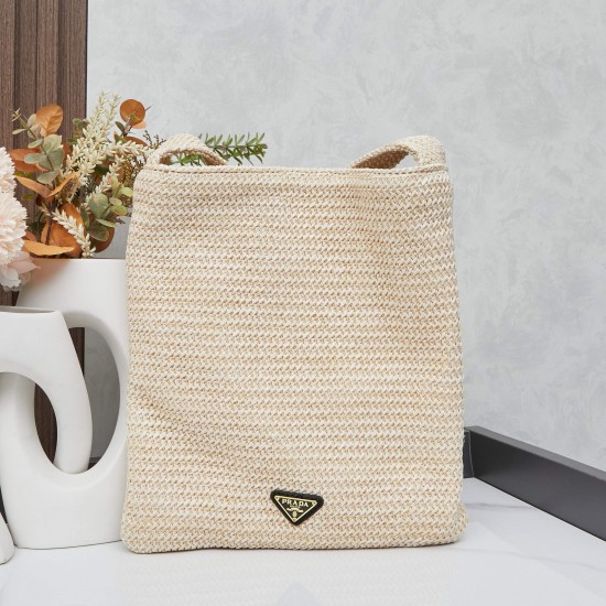 280 Prada Crossbody Bag in raffiaThis softly deconstructed crossbody bag is crafted in raffia, a lightweight, natural material that expresses the heart of summerThe iconic house triangle logo is reintroduced to decorate the front of the bagEmbroidered let