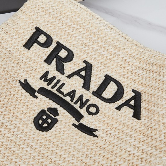 280 Prada Crossbody Bag in raffiaThis softly deconstructed crossbody bag is crafted in raffia, a lightweight, natural material that expresses the heart of summerThe iconic house triangle logo is reintroduced to decorate the front of the bagEmbroidered let