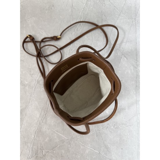 P4805NF460 light brown new mini bucket bag made of top imported lambskin leather is super soft and cost-effective can manage a variety of styles very playful and cute can be shoulder crossbody handheld shoulder shape varied bag is small but very loaded si